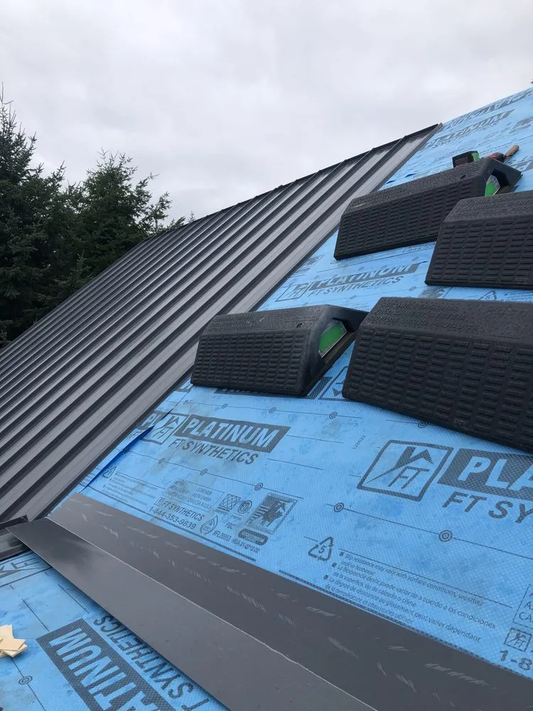 Slide of Adams Roofing 2.0