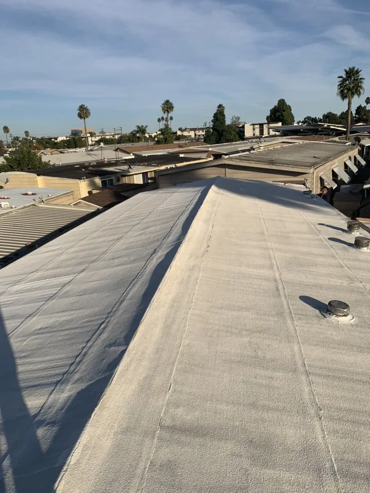 Slide of Adams Roofing