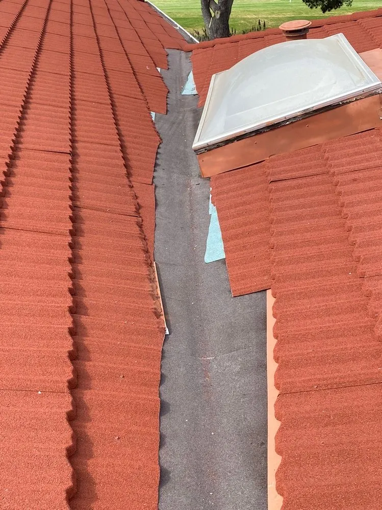 Slide of Adams Roofing