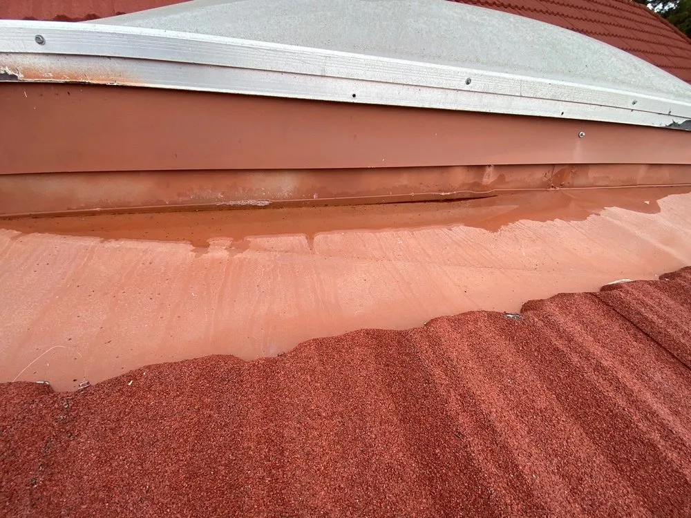 Slide of Adams Roofing