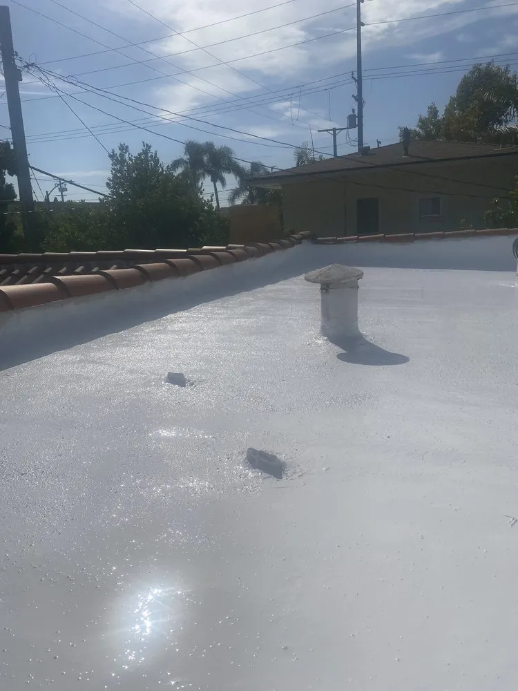 Slide of Adams Roofing