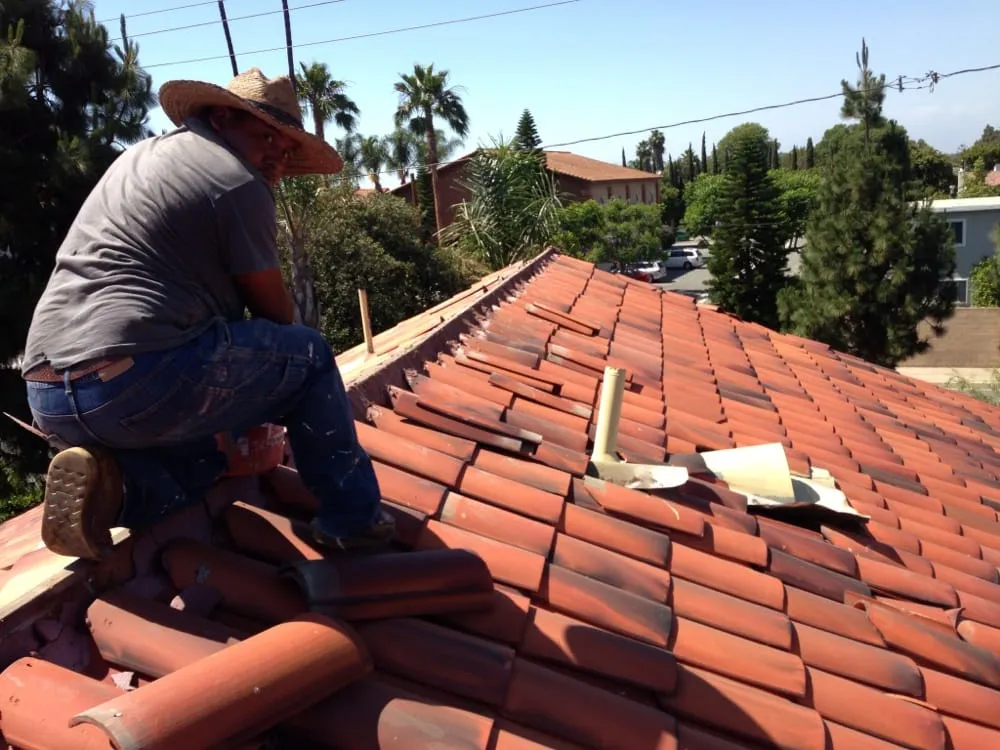 Slide of Adams Roofing