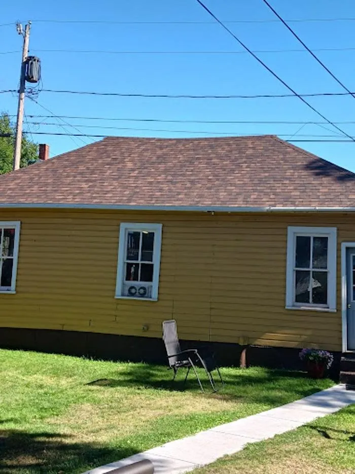 Slide of Adam's Roofing