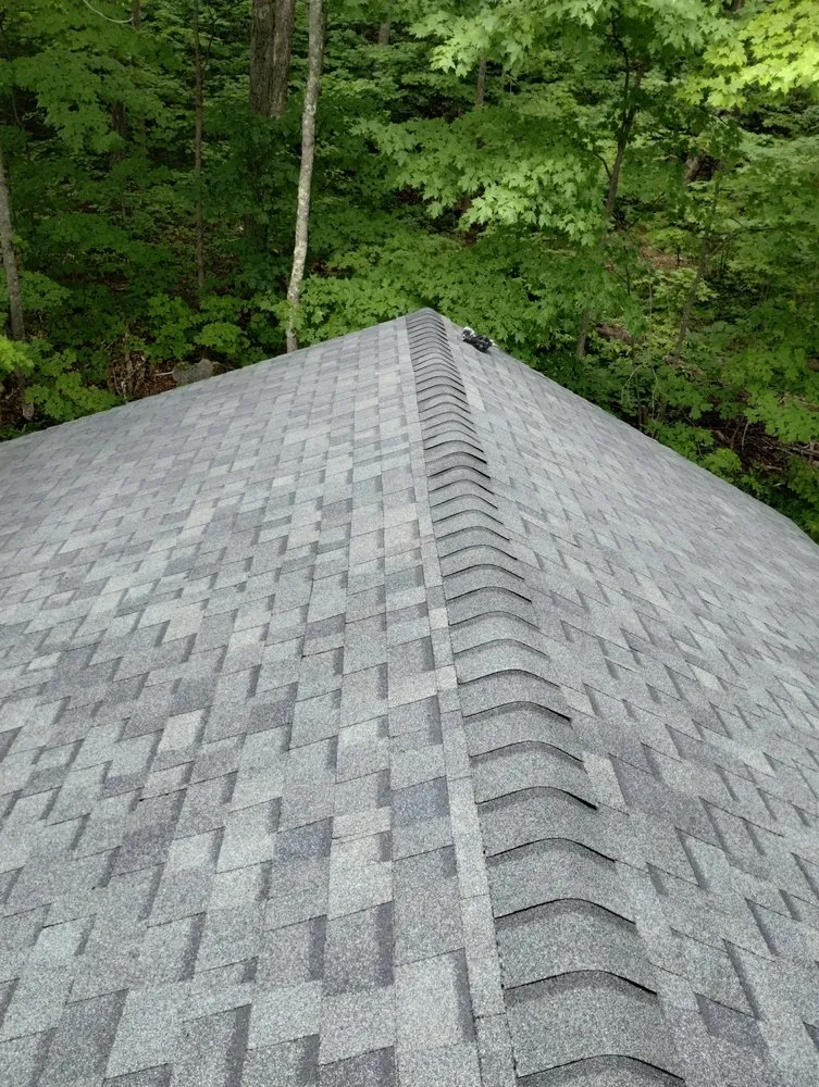 Slide of Adam's Roofing