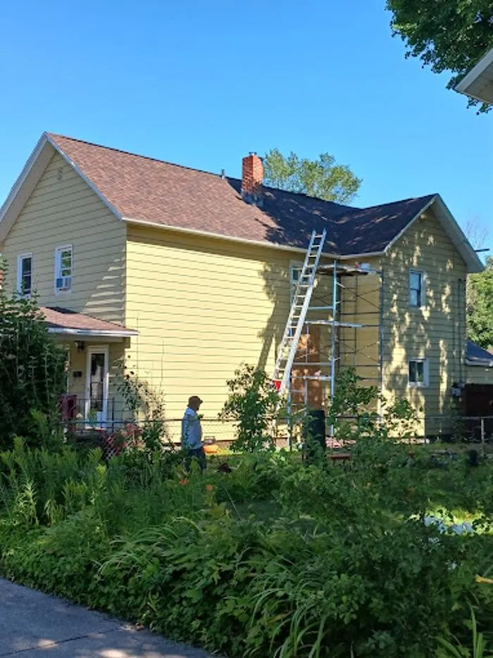 Slide of Adam's Roofing