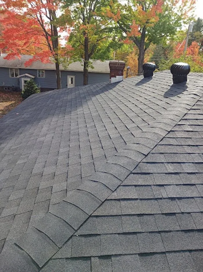 Slide of Adam's Roofing