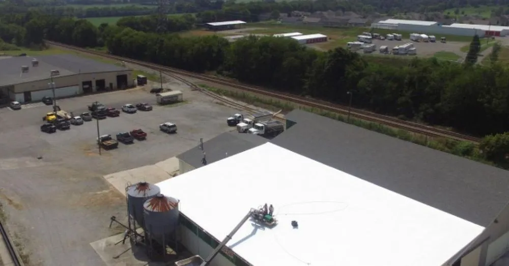 Slide of Adams Roofing