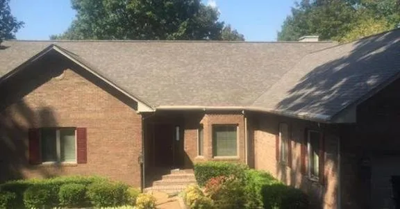 Slide of Adams Roofing