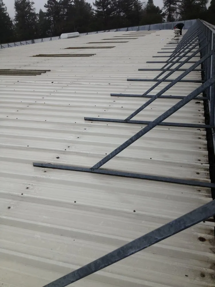 Slide of Adams Roofing