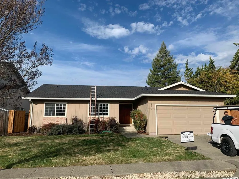 Slide of Adams Roofing