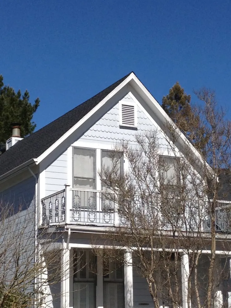 Slide of Adams Roofing