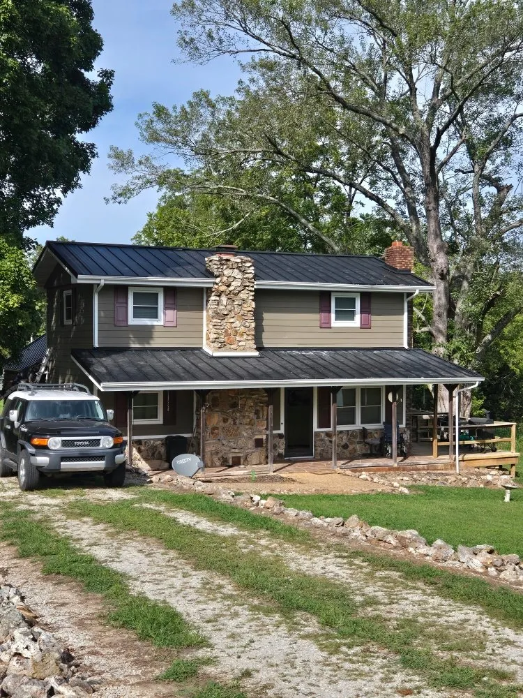 Slide of Adams Roofing