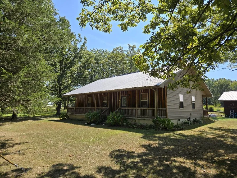 Slide of Adams Roofing