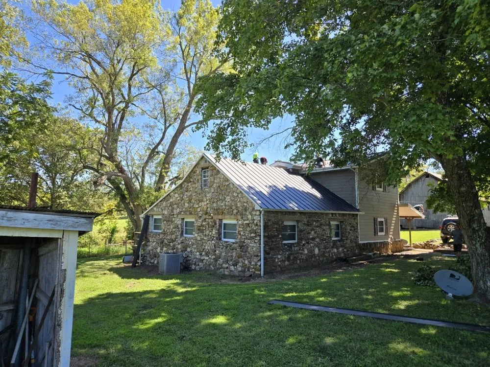 Slide of Adams Roofing