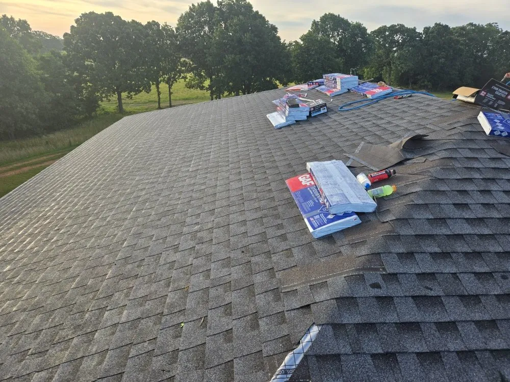 Slide of Adams Roofing