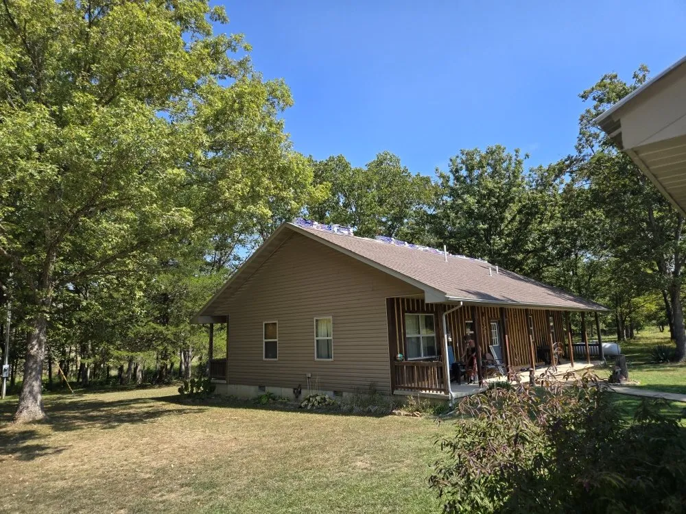 Slide of Adams Roofing