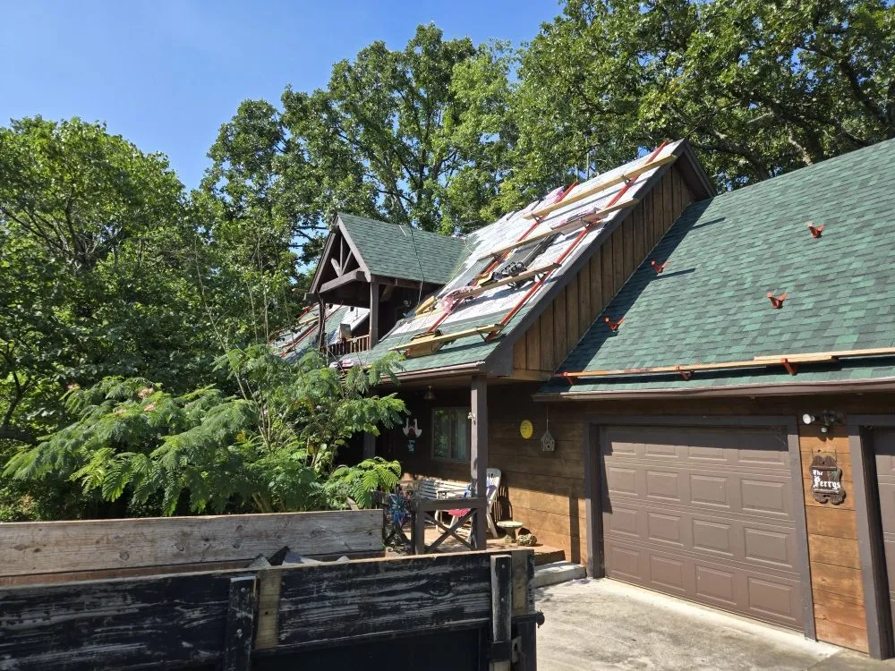 Slide of Adams Roofing