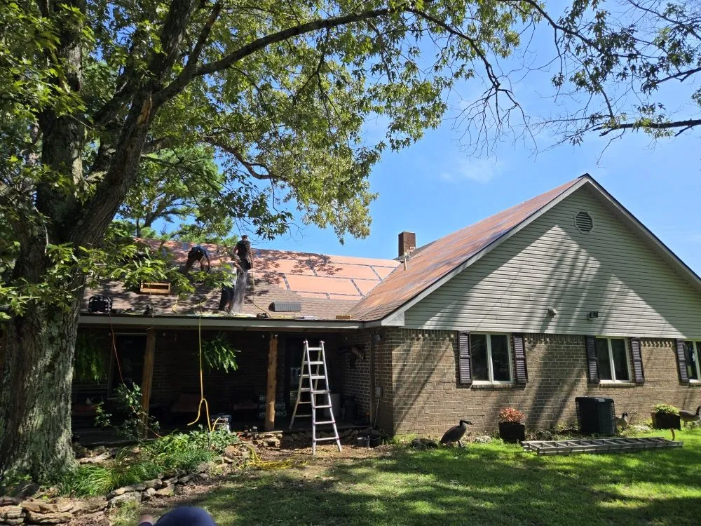 Slide of Adams Roofing