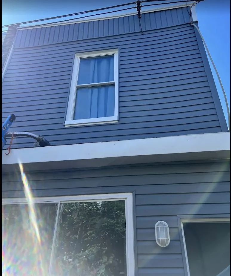 Slide of Adams Siding and Windows