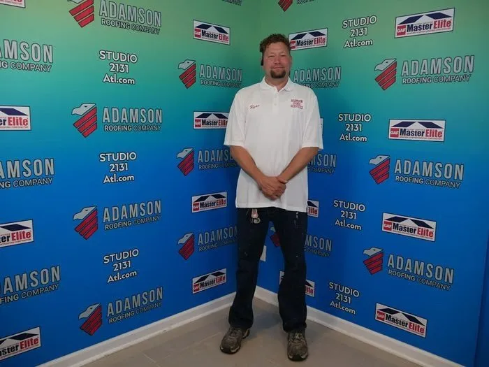 Slide of Adamson Roofing Company