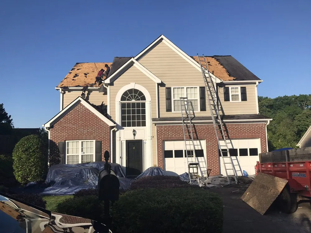 Slide of Adamson Roofing Company