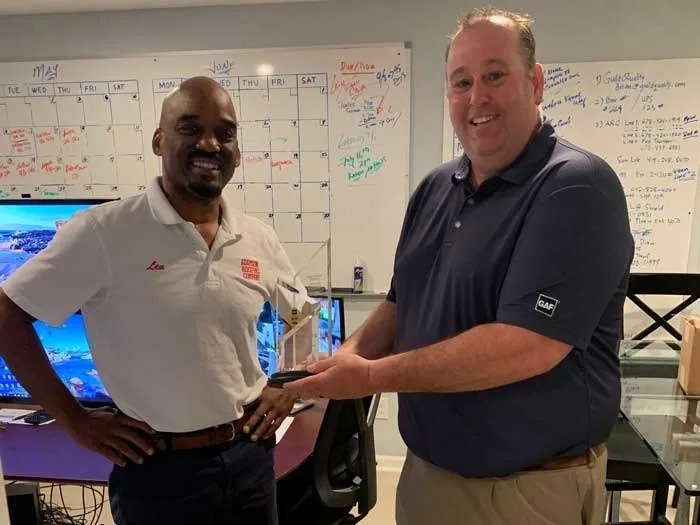 Slide of Adamson Roofing Company