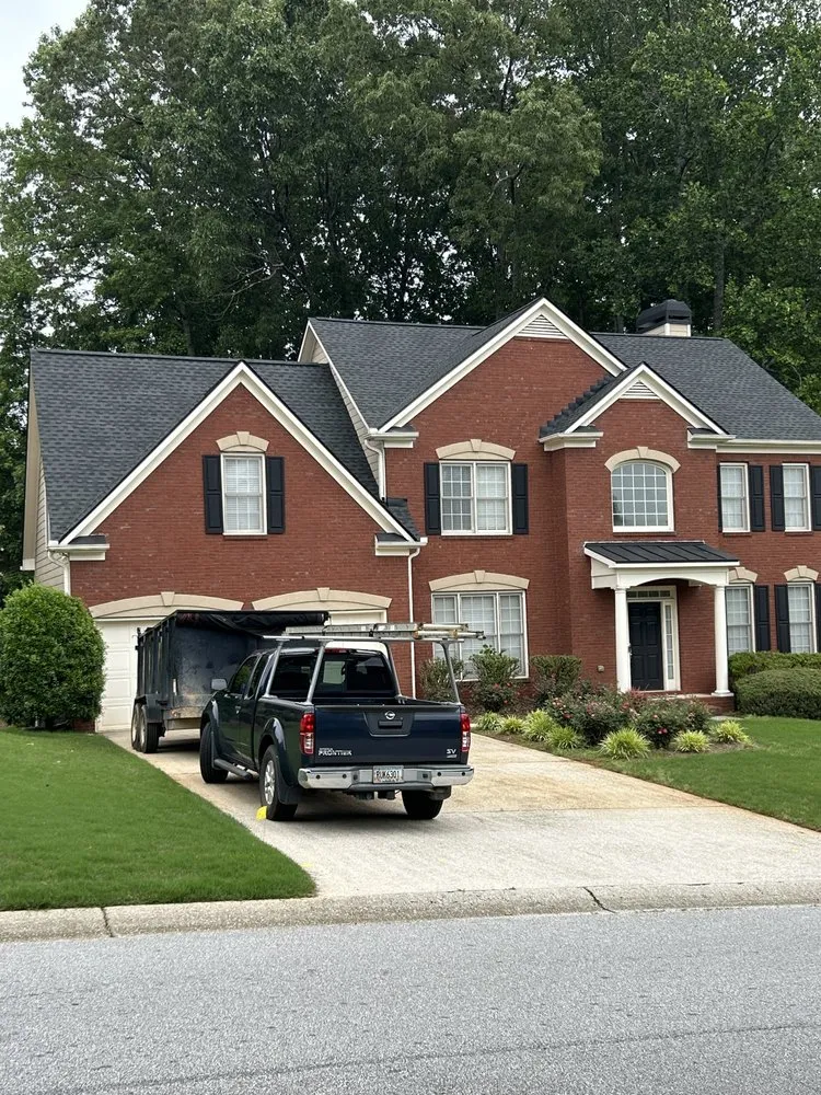 Slide of Adamson Roofing Company