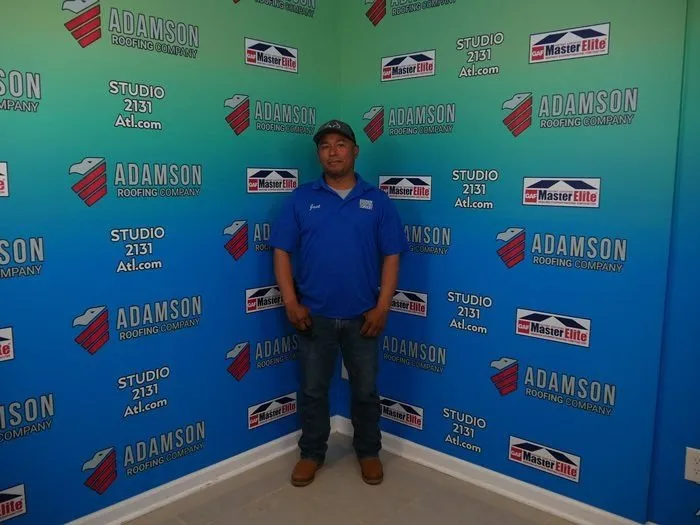 Slide of Adamson Roofing Company