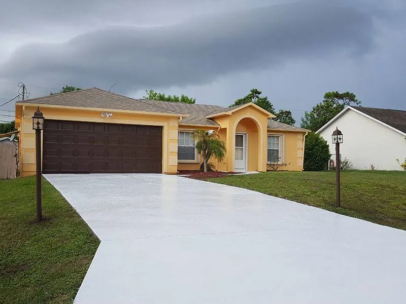 Emergency metal roofing installation in Port St. Lucie, FL by Adan Painting Services