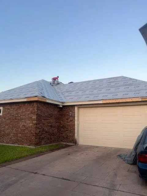 Slide of Adan’s Roofing & Construction