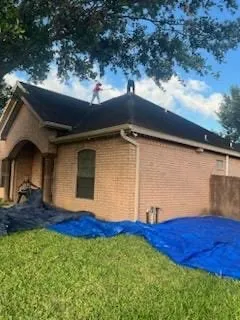 Slide of Adan’s Roofing & Construction