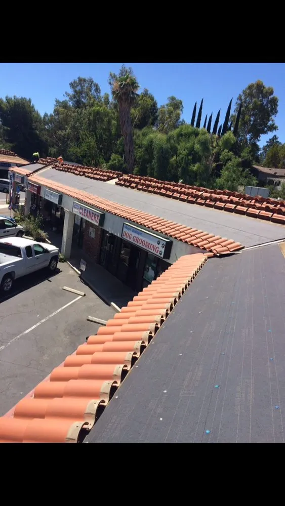 Slide of Adato Roofing
