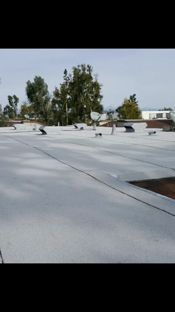 Slide of Adato Roofing