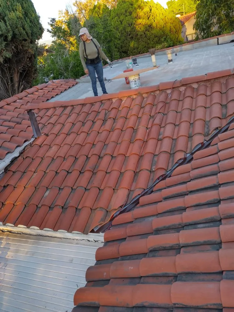 Slide of ADG Roofing & Construction