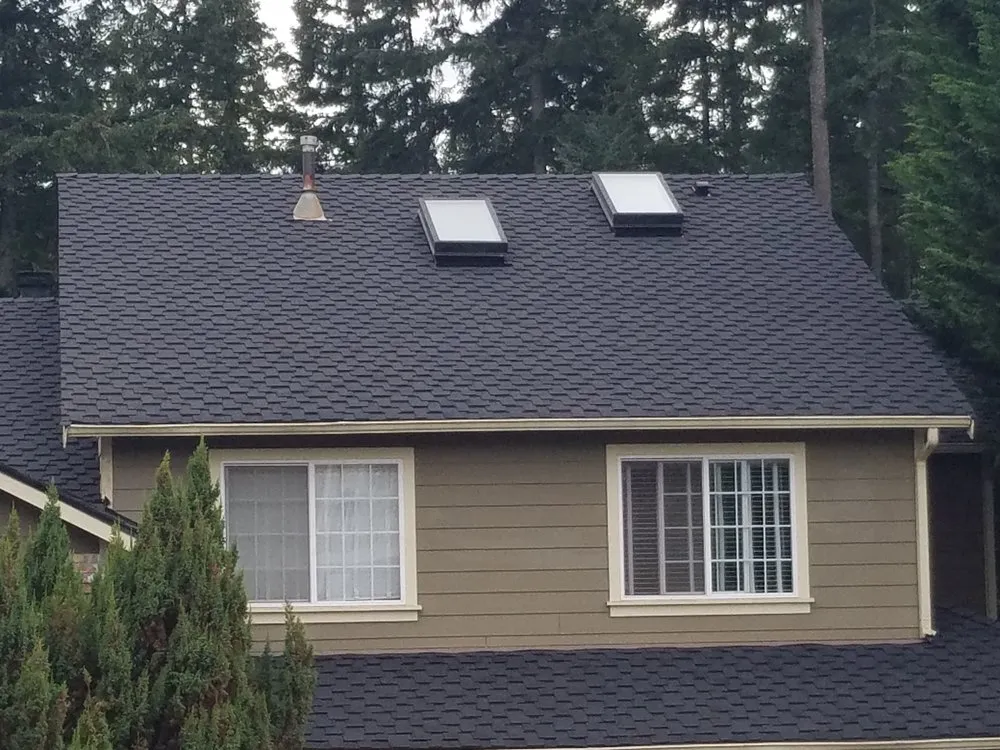 Slide of Adkins Roofing