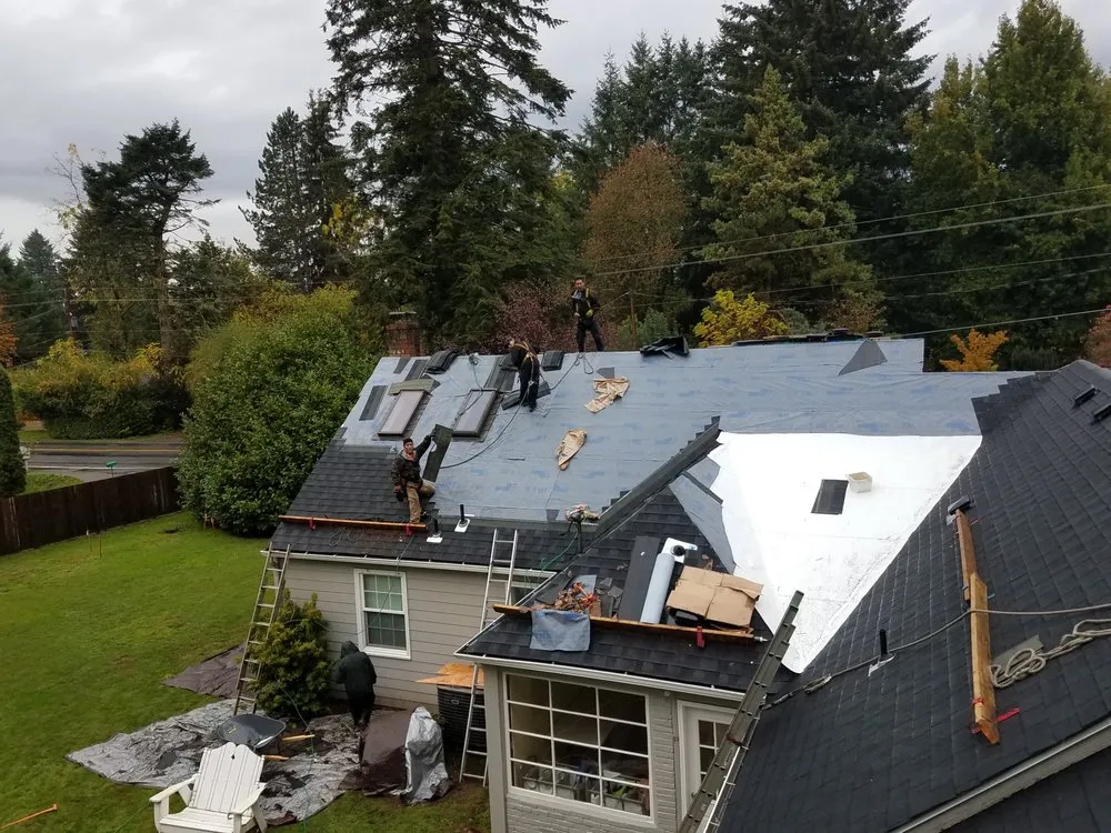 Slide of Adkins Roofing