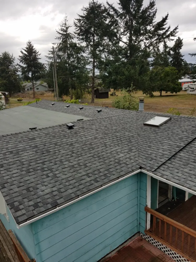 Slide of Adkins Roofing