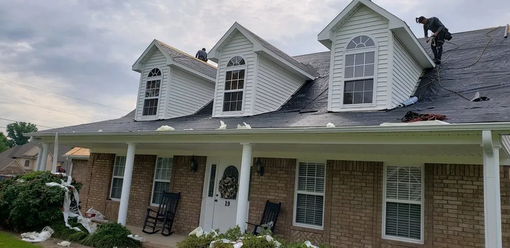 Slide of Admiral Custom Roofing