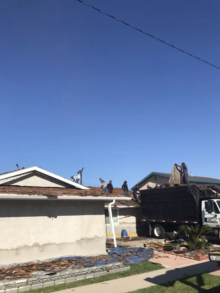 Slide of Adolfo's Hauling & Demolition