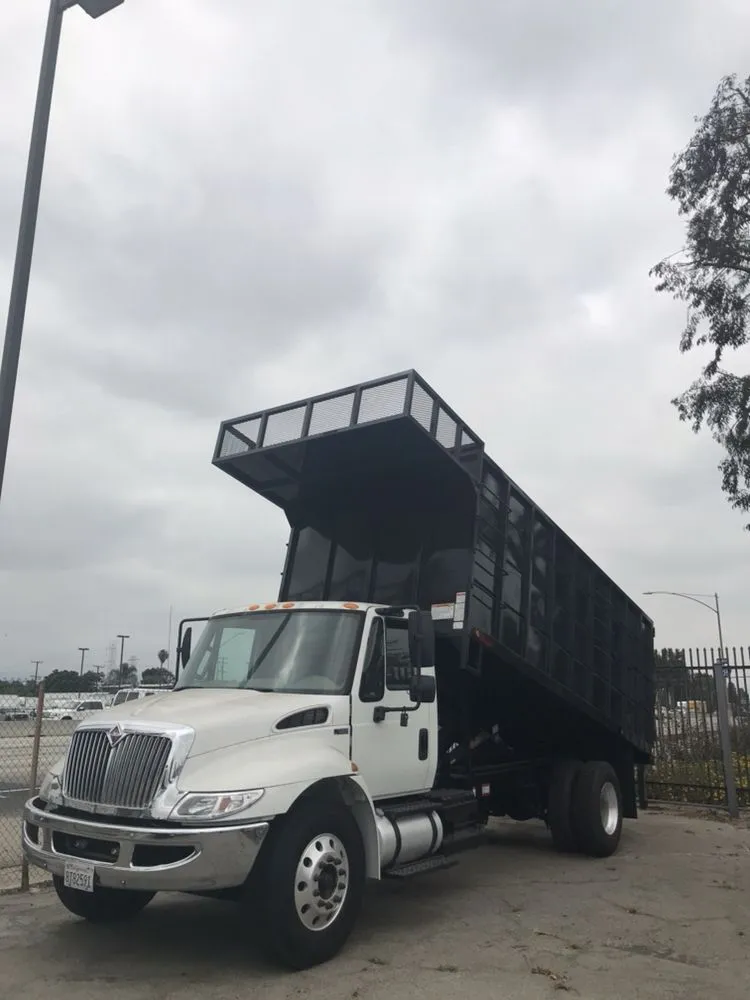 Slide of Adolfo's Hauling & Demolition
