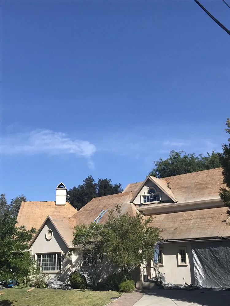 Slide of Adolfo's Hauling & Demolition