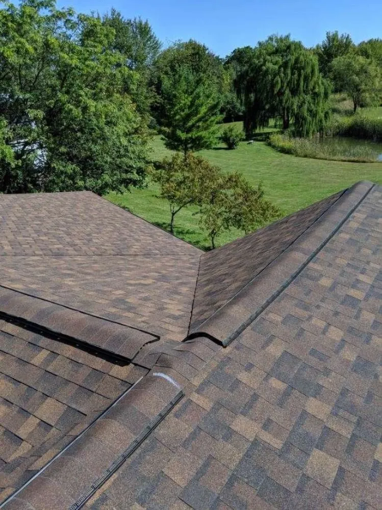 Slide of Adonis Roofing