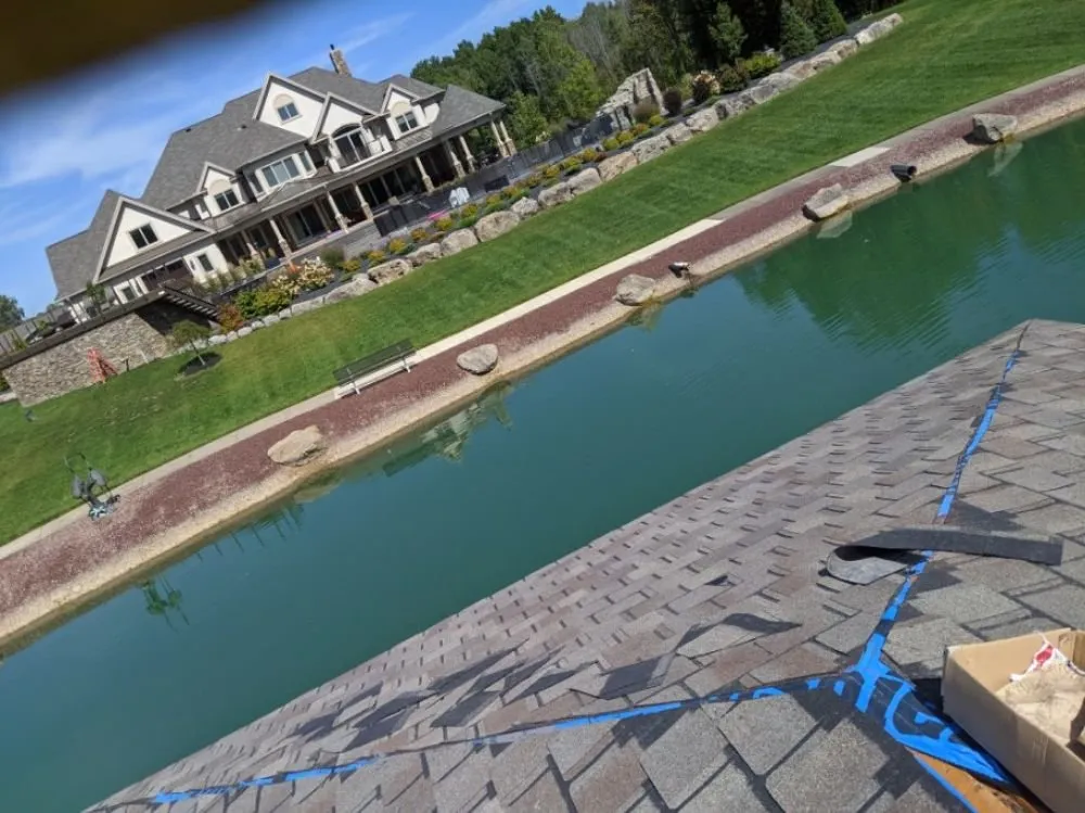 Slide of Adonis Roofing