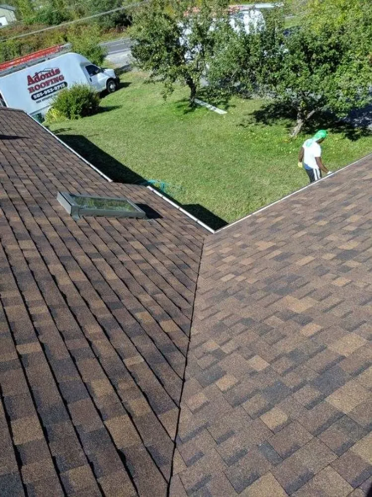 Slide of Adonis Roofing