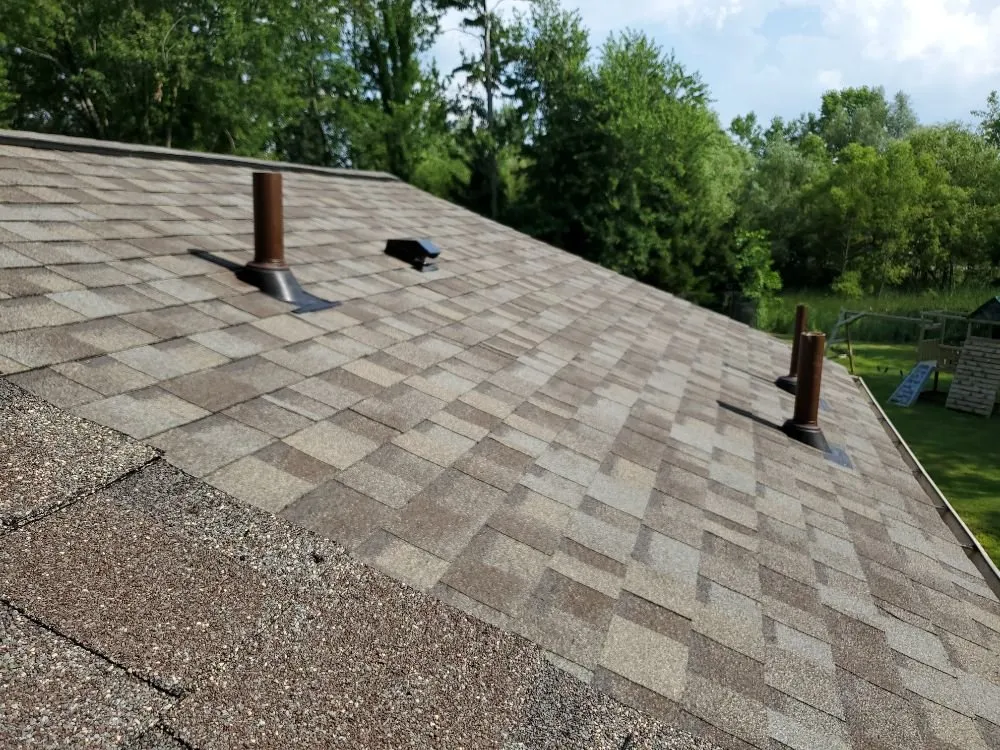 Slide of Adonis Roofing