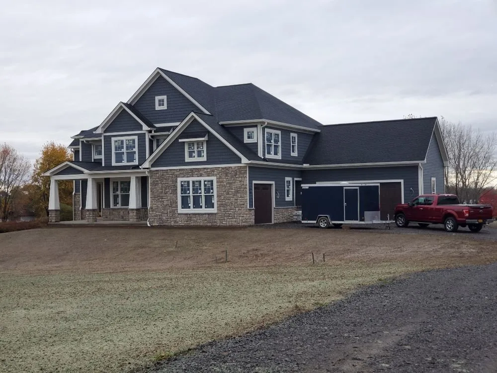 Slide of Adonis Roofing