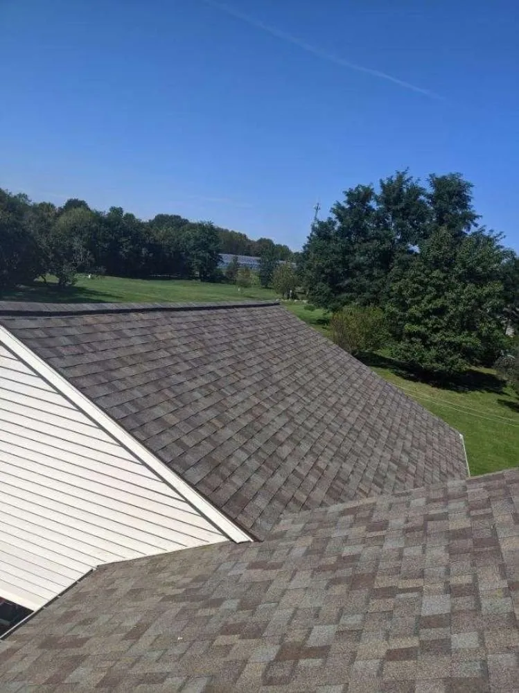 Slide of Adonis Roofing