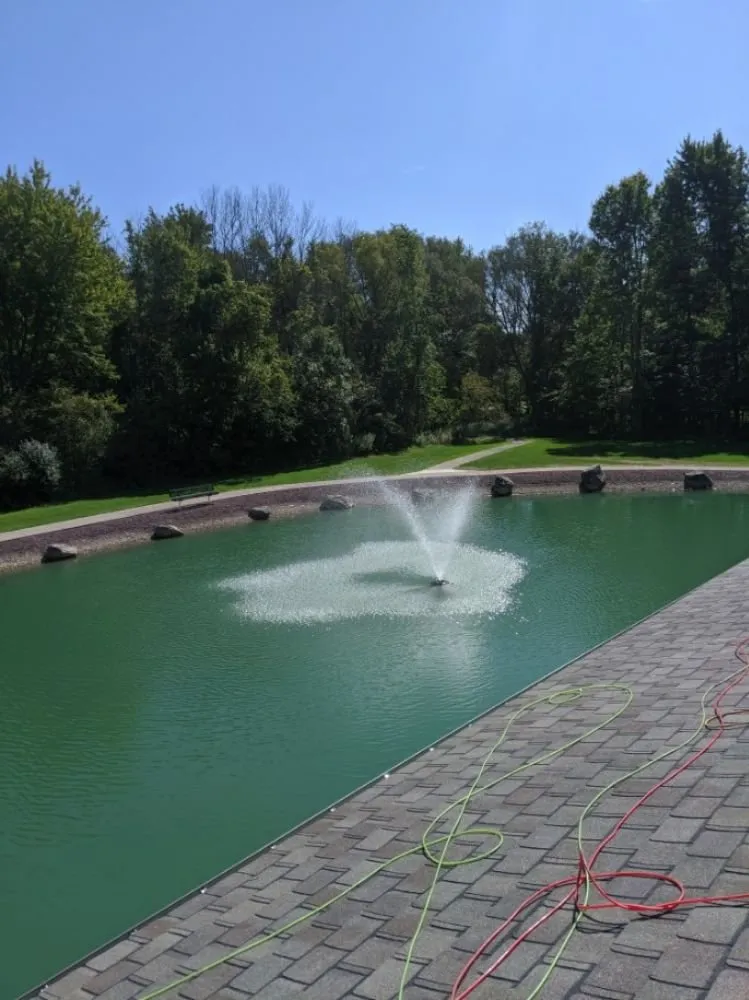 Slide of Adonis Roofing