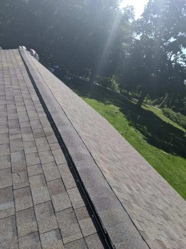 Slide of Adonis Roofing