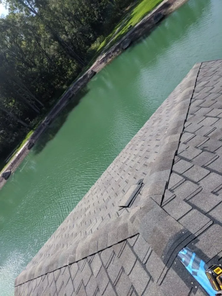 Slide of Adonis Roofing